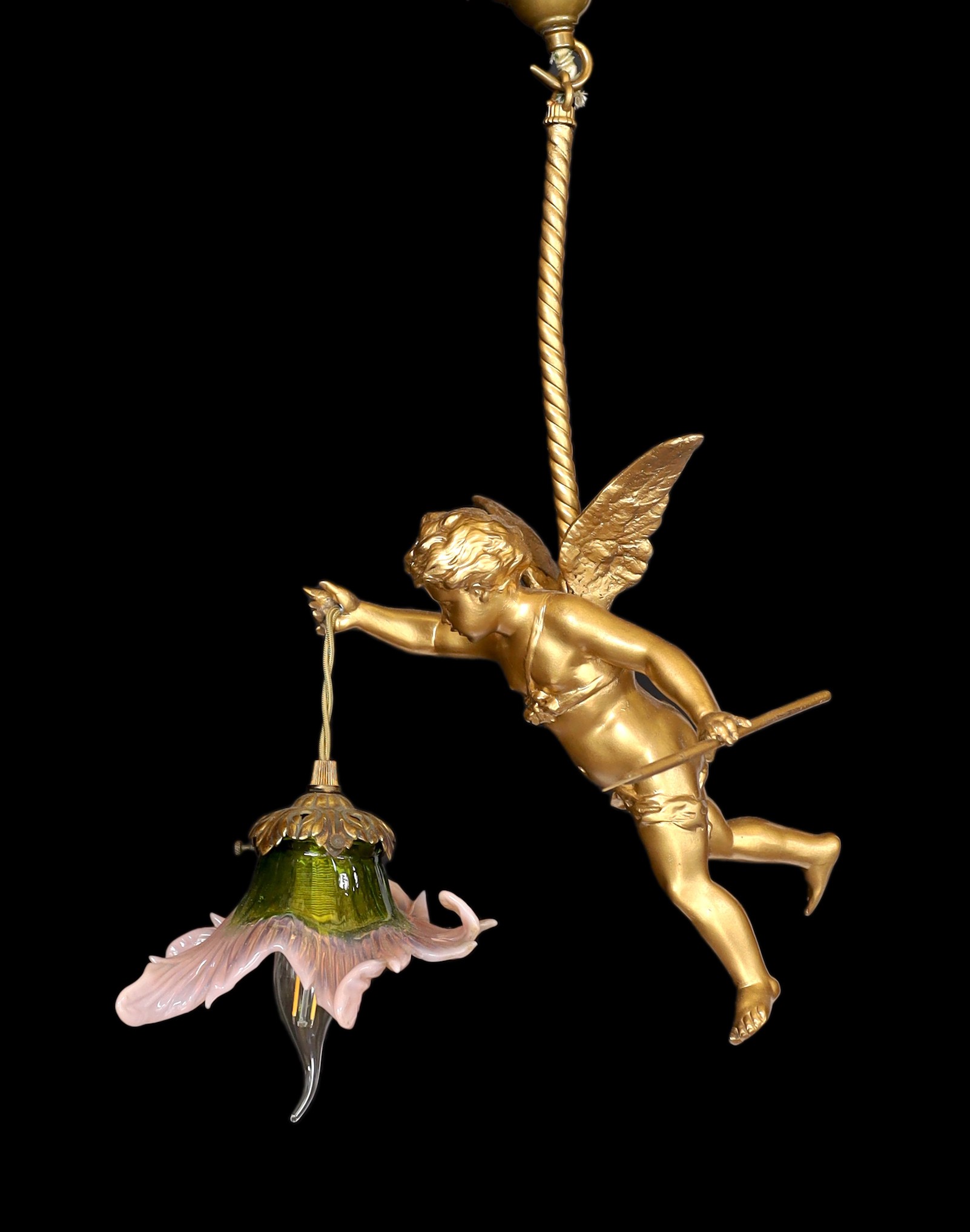 A 1920s English gold painted spelter Cupid light fitting with coloured glass shade, height 54cm. width 24cm